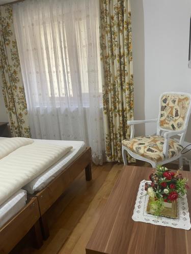 Ένα ή περισσότερα κρεβάτια σε δωμάτιο στο Casa Linistita