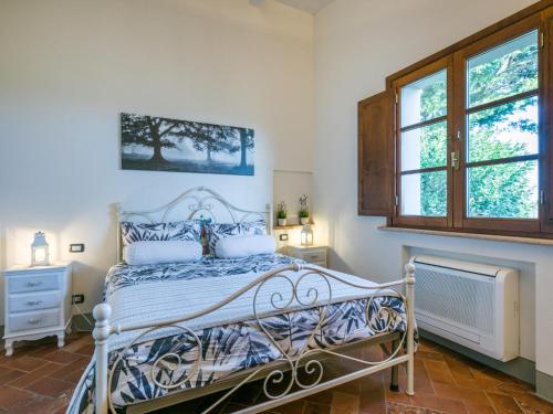 Postel nebo postele na pokoji v ubytování Holiday Home Casale L'Uliveta by Interhome