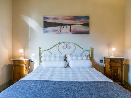 Postel nebo postele na pokoji v ubytování Holiday Home Casale L'Uliveta by Interhome