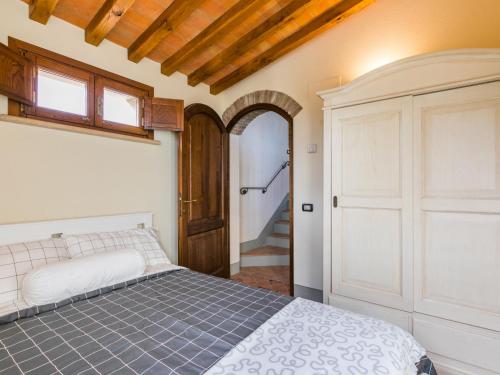 Postel nebo postele na pokoji v ubytování Holiday Home Casale L'Uliveta by Interhome