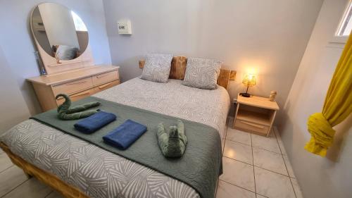 Posteľ alebo postele v izbe v ubytovaní Appartement T3 avec extérieur