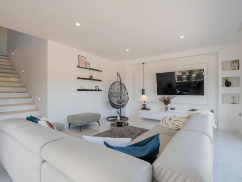 a white living room with a white couch at Villa Villa Karin by Interhome in Imotski