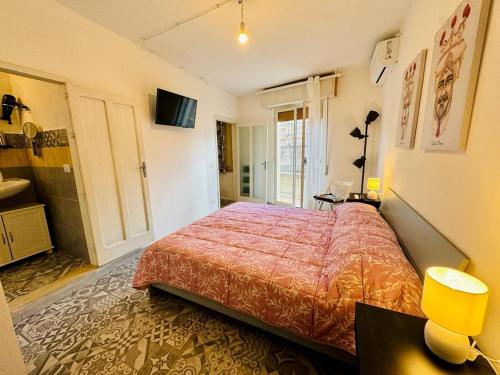 Ένα ή περισσότερα κρεβάτια σε δωμάτιο στο La Casa d'Ilà