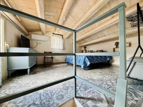 Ένα ή περισσότερα κρεβάτια σε δωμάτιο στο La Casa d'Ilà