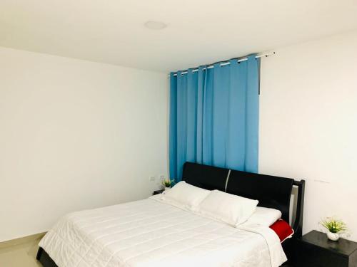 Ein Bett oder Betten in einem Zimmer der Unterkunft Apartahotel Bahia Tropical II