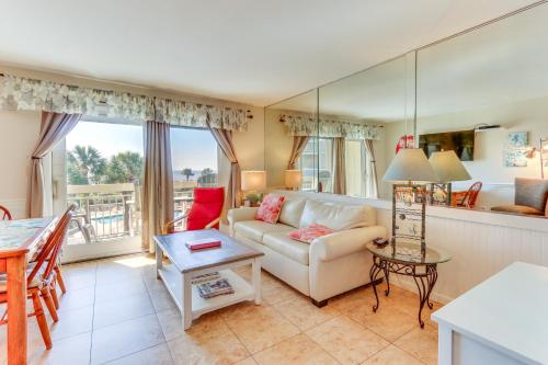 a living room with a couch and a table at Ocean-View Balcony Beachfront Hilton Head Condo in Hilton Head Island