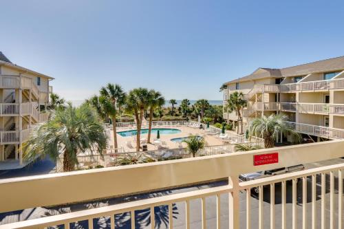 a view of the pool from the balcony of a resort at Ocean-View Balcony Beachfront Hilton Head Condo in Hilton Head Island