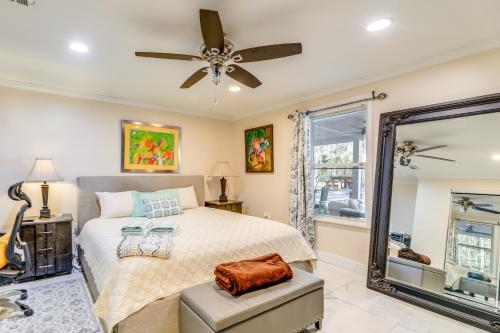 a bedroom with a bed and a ceiling fan at Secluded Newport Getaway with Fire Pit and Grill! in Havelock