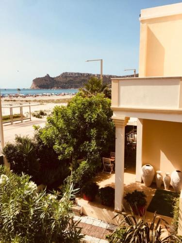 a building with a view of the beach at Villa Maria Luisa in Cagliari