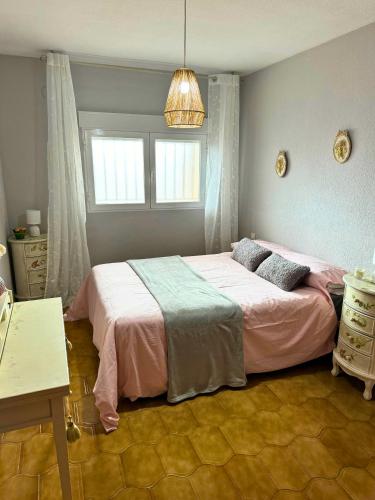 Кровать или кровати в номере Home4u Alojamiento en Plaza de Gracia