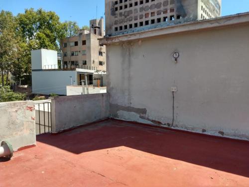 a rooftop of a building with a skateboard on it at Monoambiente en Terraza in Mendoza
