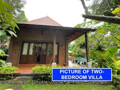 a home with a picture of two bedroom villa at Villa Lombok Senggigi Kamila Forest By Villaloka in Mangsit