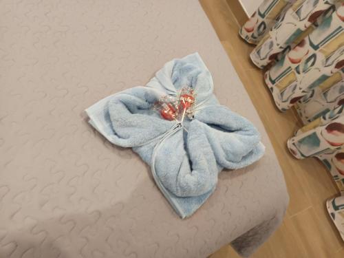 a blue towel sitting on top of a bed at Mojacar Luxury in Mojácar