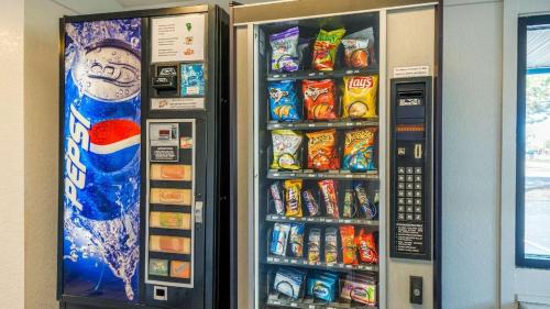 a vending machine filled with lots of food and drinks at Hilliard Motor Lodge in Hilliard