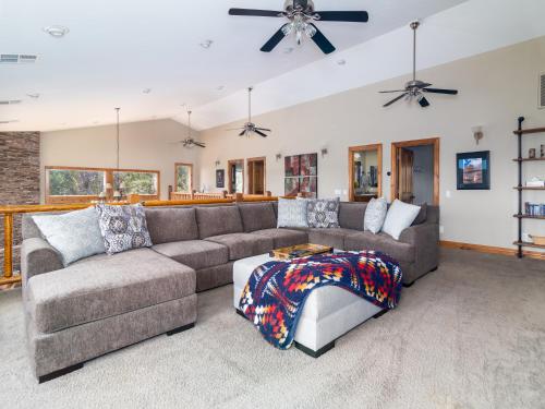 a living room with a couch and a table at Rustic Pine- Secluded Mountain Retreat Near Zion National Park in Orderville