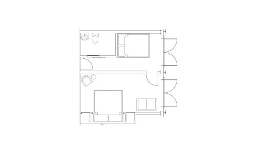 a floor plan of a house at Field Guide Lodge in Stowe
