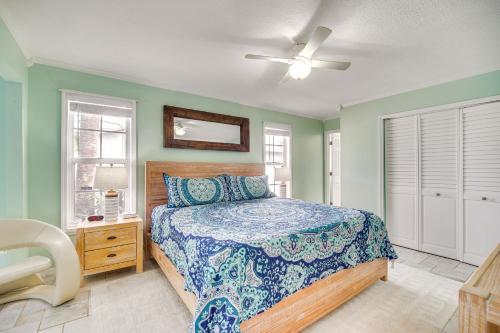 a bedroom with a bed and a ceiling fan at Sebastien Home with Pool and Gazebo - 8 Mi to Beaches! in Sebastian