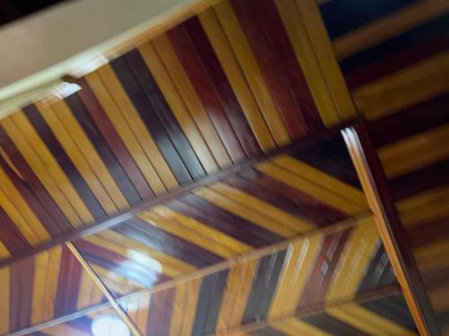 a close up of a wooden ceiling in a room at Apex guest facility in Buea