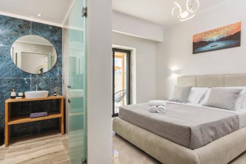 Postel nebo postele na pokoji v ubytování Mateo & Filipos Luxury Villas