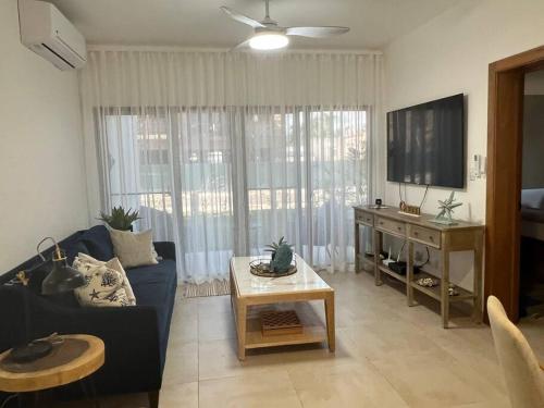 Costal condo with gym and Olympic pool