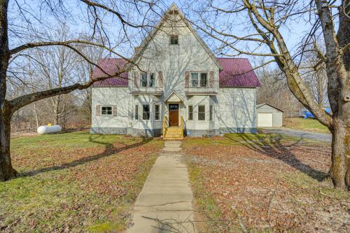 a large white house with a red roof at Altmar Home with Fire Pit Less Than 1 Mi to Salmon River! in Pulaski