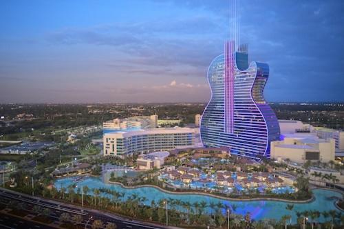 a view of a large building with a guitar shaped building at Cozy Private House near Miami Airport - Free parking - 01 in Miami