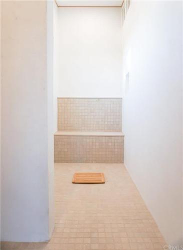 a room with a wooden mat on the floor at Joshua Tree Modern Cabin- Goat Mountain Rising in Landers