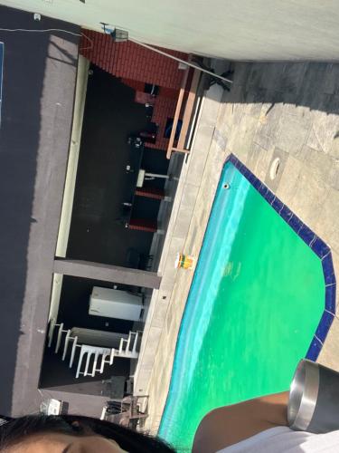 A view of the pool at Casa de piscina poa or nearby