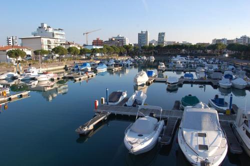 a group of boats docked in a marina at Hotel Irene in Lignano Sabbiadoro