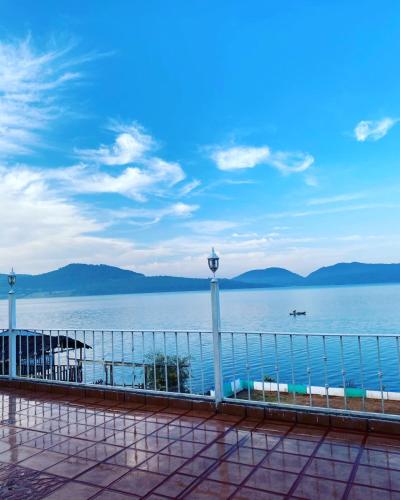a view of the water from a pier at Cabañas y Habitaciones El Malecón in Zirahuén