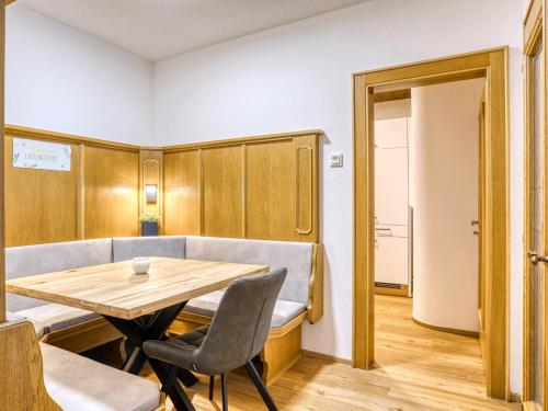 a dining room with a table and chairs at Bergliebe in Kappl