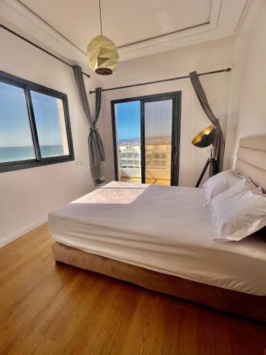 Ένα ή περισσότερα κρεβάτια σε δωμάτιο στο Baya House Sea View