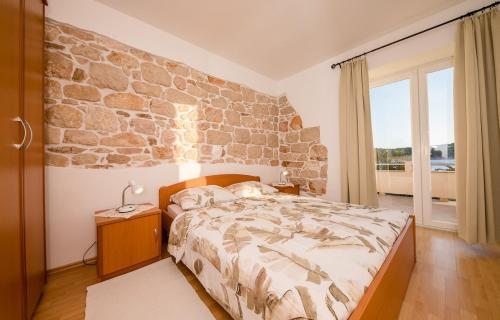 Apartments by the sea Barbat, Rab - 22757