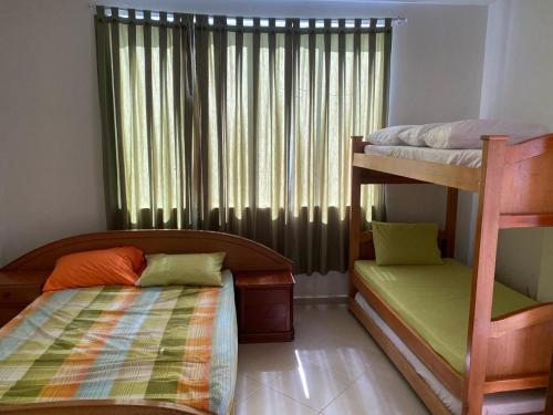 Tempat tidur susun dalam kamar di Finca en San Jerónimo, todas las comodidades