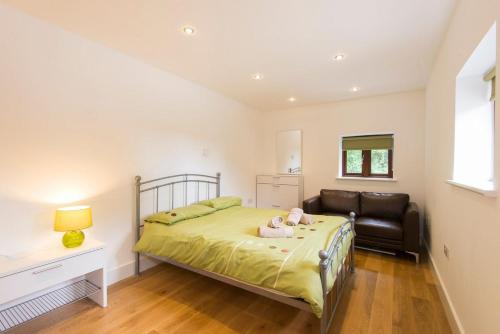 מיטה או מיטות בחדר ב-Jubilee Cottage - Cwc75016