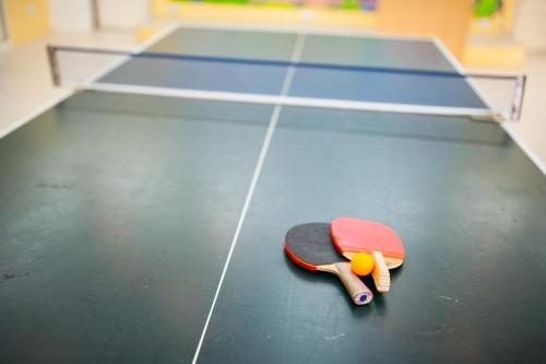 a skateboard laying on the floor in a room at 光腳丫宜蘭民宿 in Dongshan