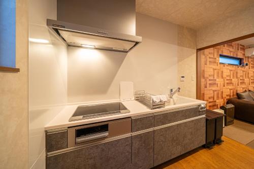 A cozinha ou cozinha compacta de 石垣泉