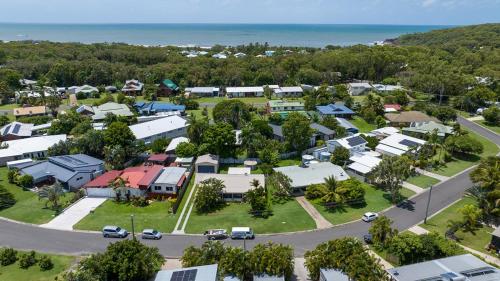 an aerial view of a small town with cars parked at Bella Rose Beach House - 3 BR - 5min to Beach in Agnes Water