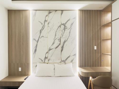 Uma cama ou camas num quarto em Lộc Thiên Ân hotel