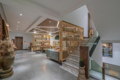 Fotografie z fotogalerie ubytování Xisu Garden Inn v destinaci Li-ťiang