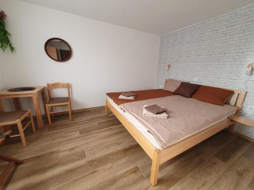 Postel nebo postele na pokoji v ubytování Pension TTT