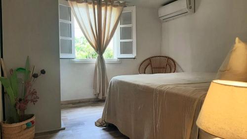 Postel nebo postele na pokoji v ubytování Le gîte du pavé