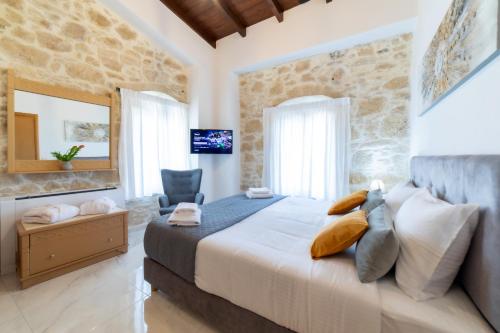 Postel nebo postele na pokoji v ubytování Asmani Apartments