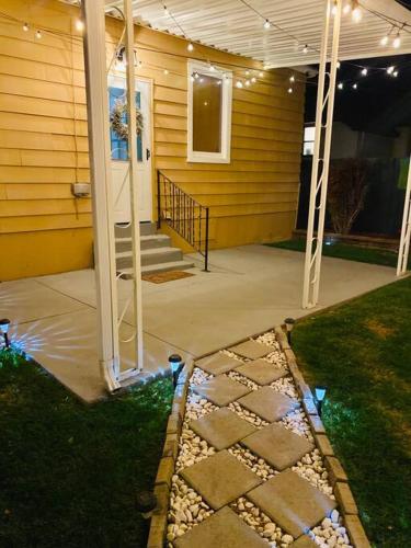 a front porch of a house with lights on it at Serenity Guest Suite in Pocatello in Pocatello