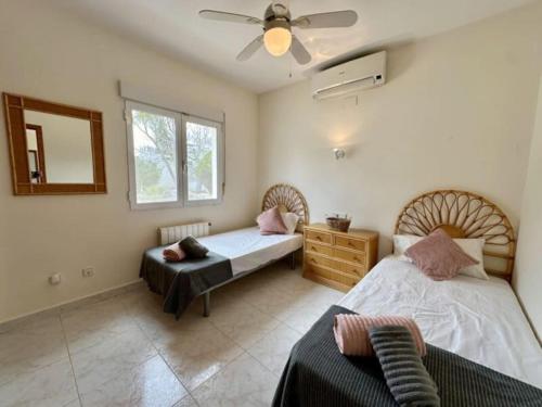 Posteľ alebo postele v izbe v ubytovaní Three bedroom villa with private pool in Moraira