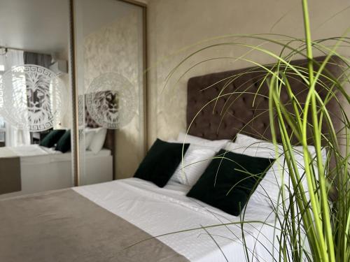 Кровать или кровати в номере Apartments VIP AVALON