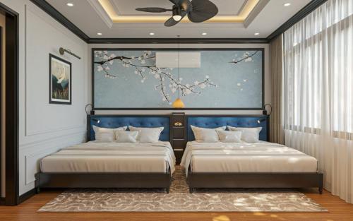 Ліжко або ліжка в номері Thuy Duong Boutique Hotel Hue