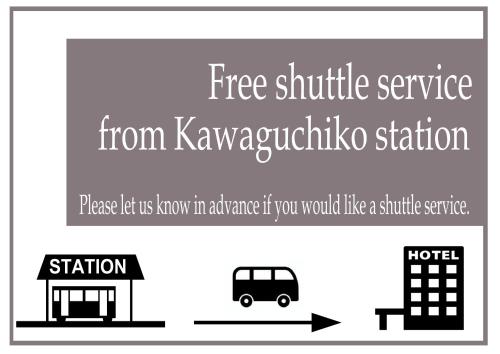 a sign that says free shuttle service from kawasakiynchronous station at SAZANAMI LAKE FRONT in Fujikawaguchiko
