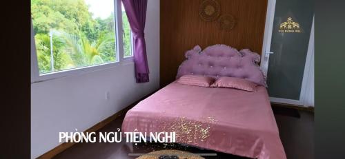 Giường trong phòng chung tại VOI RỪNG HILL HOMESTAY
