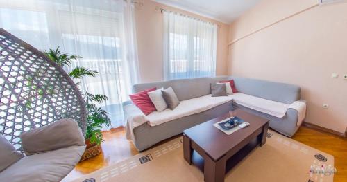 Posezení v ubytování Spacious apartment overlooking Mostar